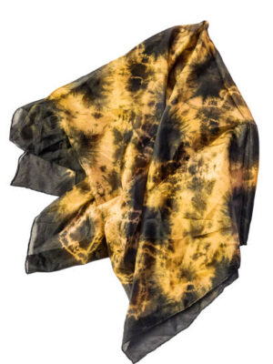 Folded yellow and black silk vintage kerchief isolated over white